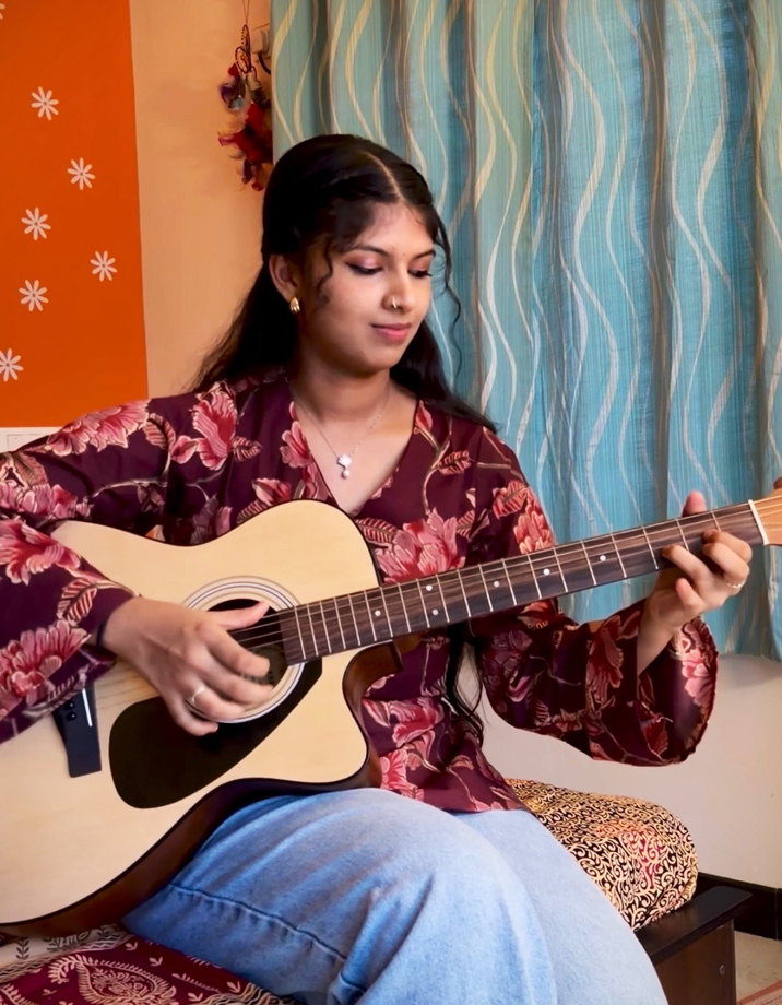 Aarya Playing Guitar